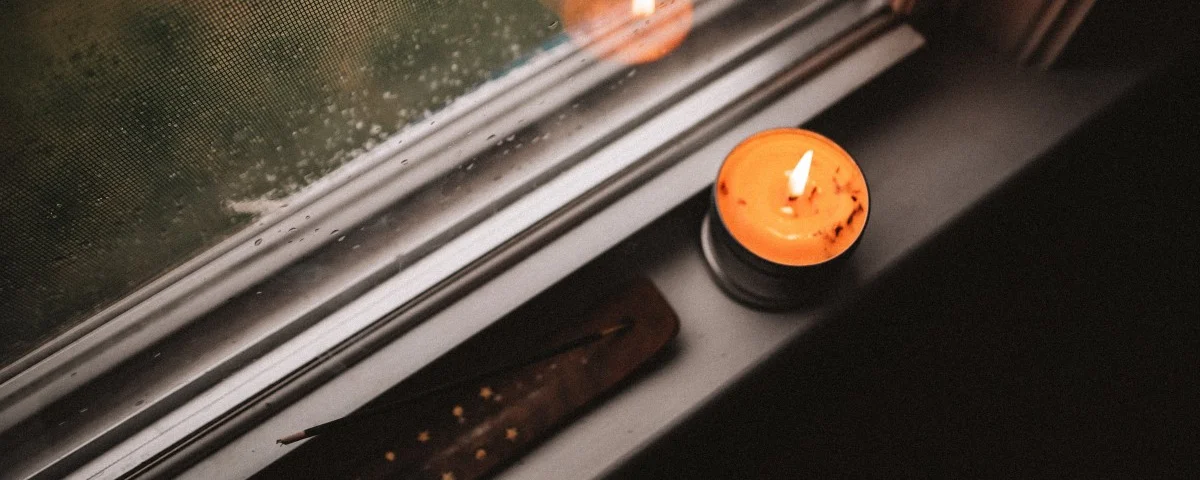Kerze Fenster Regen